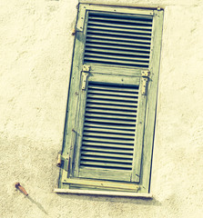 Particular view of an ancient window in a farmhouse of the 800s