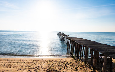 Sea view, blue sky, old wooden bridge, beautiful summer