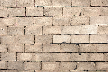 Close-up of the Texture of the Ground Paved with Bricks and Stones