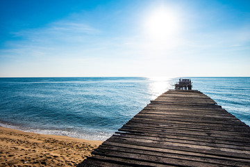 Sea view, blue sky, old wooden bridge, beautiful summer
