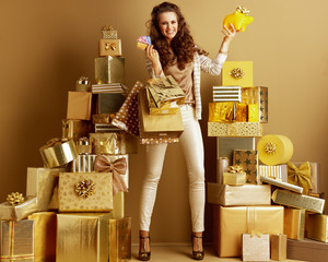 shopper woman with shopping bags, credit cards showing yellow pi