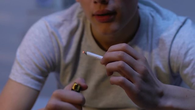 Ill patient smoking medical marijuana to reduce pain, weed legalization, therapy