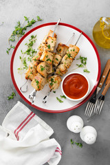 Grilled meat skewers, chicken shish kebab top view