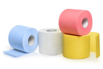 Several rolls of coloured toilet paper, isolated on white background