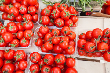 red ripe cherry tomatoes in basket