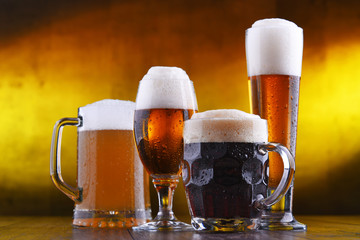 Composition with four glasses of beer