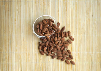 Healthy food  for background image close up almond nuts. Texture Nuts on the cup plate