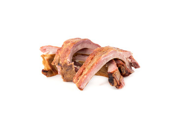 Smoked ribs on a white background. Smoked ribs close-up on a white background.