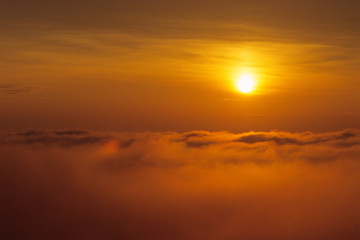Fototapeta na wymiar Sunrise of a sea of clouds - 雲海の朝日
