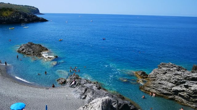 San Nicola Arcella, Cosenza, Calabria, Italy - September 6 2018: bathers on a bay of San Nicola Arcella near the Arcomagno, a beautiful Italian beach of the Mediterranean sea (Tyrrhenian)