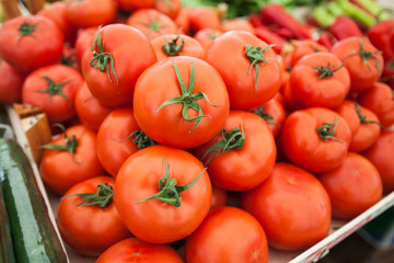 Fresh red ripe tomatoes at farmers market