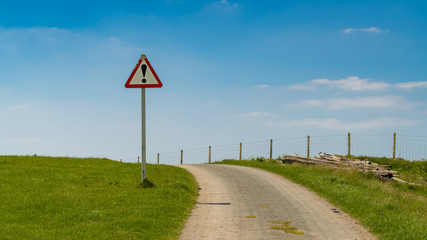 Sign: Danger, seen on the Panorama Walk, near Aberdovey, Gwynedd, Wales, UK