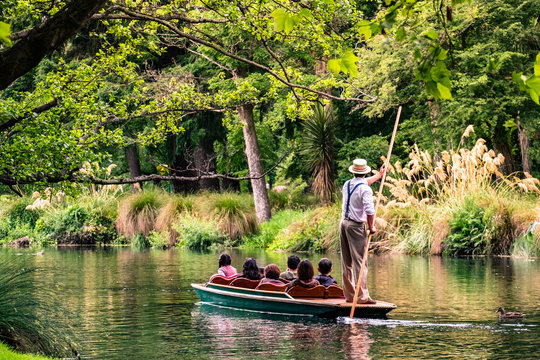 New Zealand, Christchurch, People Are Enjoing On The Boat On The River In Botanic Garden.