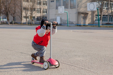 child riding scooter outdoors, active sport kids © volody10