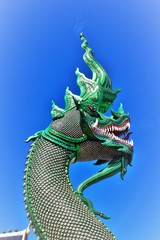 Fototapeta premium Great naga statue, King of nagas,Serpent. Naga statue at Banden temple, Chiang Mai. Thailand.