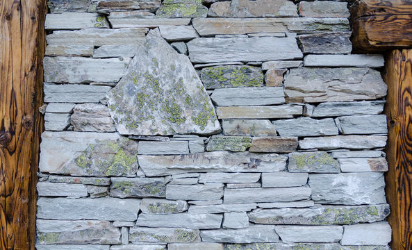 Swiss chalet old stone wall