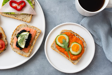 Breakfast toasts with various toppings. Healthy bruschetta. Bread sandwich.