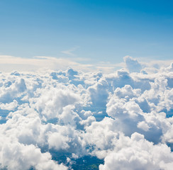 Fototapeta premium Aerial view, the large fluffy clouds above the land