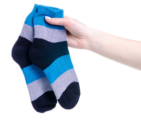 Pair blue gray black sock in hand on white background isolation