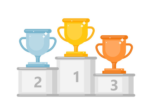 Winner podium with gold, silver and bronze trophy cups.