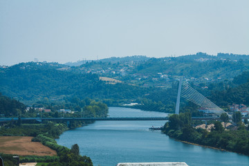 cable bridge through the river Mondego, Coimbra, Portugal