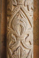 medieval stone carving on the catholic cathedral in Coimbra, Portugal