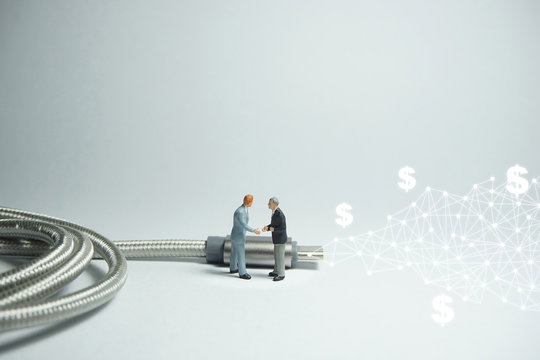 Businessman figure standing in front of usb USB type C cable. E commerce concept.