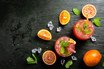 Bloody orange drink and ingredients, copy space