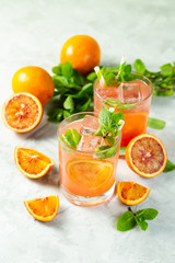 Bloody orange drink and ingredients, copy space