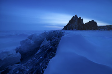 Winter morning at the rock Shamanka on Olkhon island. Lake Baikal, Russia