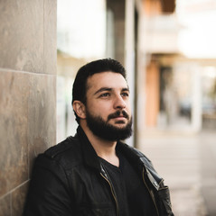 Bearded man outdoors portrait in the city