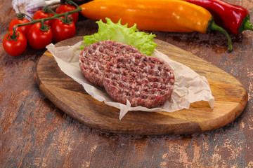 Raw burger cutlet