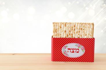 Pesah celebration concept (jewish Passover holiday). Translation for Hebrew Text Matzah utensils text: Matza