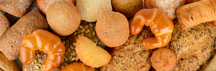 Bread, buns, croissants and other baked goods.