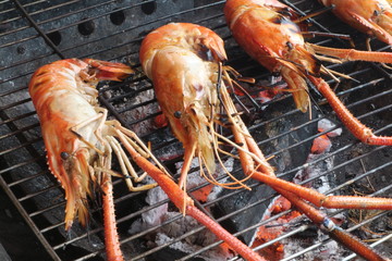 Shripms on barbicue grill.