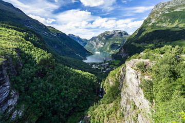 Fototapeta na wymiar Breathtaking view of the Geirangerfjord from Flydalsjuvet viewpoint during summertime, Sunnmore, More og Romsdal, Norway