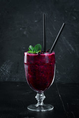 Smoothies cocktail with currants. Top view. Free space for your text. Rustic style.