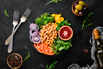 Buddha bowl. Turkish peas, broccoli, tomatoes, onions. Top view. Free space for your text.