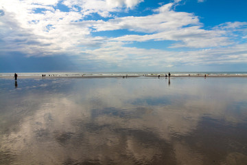 Beautiful seascape with blue sky and white clouds. English channel, Deauville beach