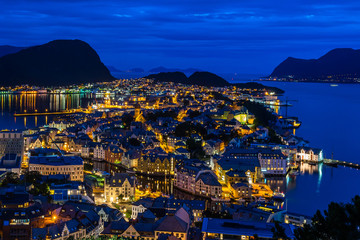 Night cityscape of Alesund historic centre seen from Aksla hill, the best viewpoint to admire the city, More og Romsdal, Norway