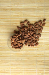 Healthy food  for background image close up almond nuts. Texture Nuts on the cup plate