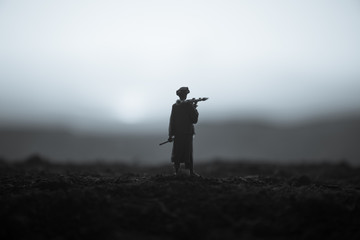 Military soldier silhouette with bazooka. War Concept. Military silhouettes fighting scene on war...