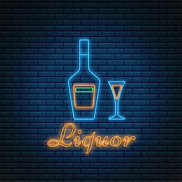 Liquor bottle and glass with lettering in neon style on brick background. Alcohol cocktail bar symbol, logo, signboard