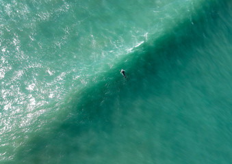 Fototapeta premium Aerial view from a surfer in a Surf Spot. Drone photo
