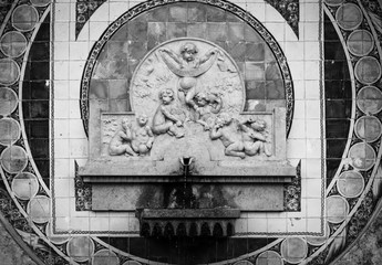 Ancient fountain with sculpted angels. Sintra Portugal