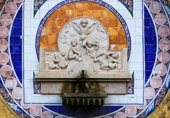 Ancient fountain with sculpted angels. Sintra Portugal