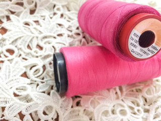 spools of thread on white background