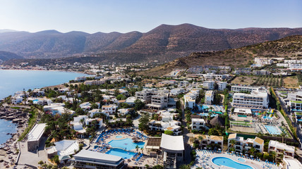 Naklejka premium Hersonissos Crete, Greece. Panoramic view from above. Summer sea and tourism on the coast of Greece