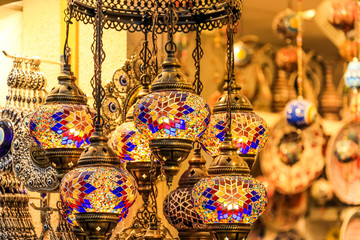 Traditional bright decorative hanging Turkish lamps and colourful lights with vivid colours  in the...