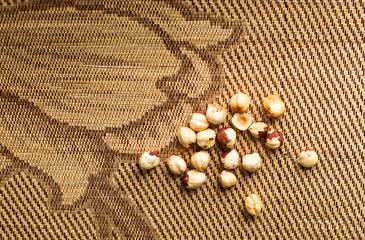 Fototapeta na wymiar Healthy food for background image close up hazelnuts. Nuts texture on top view